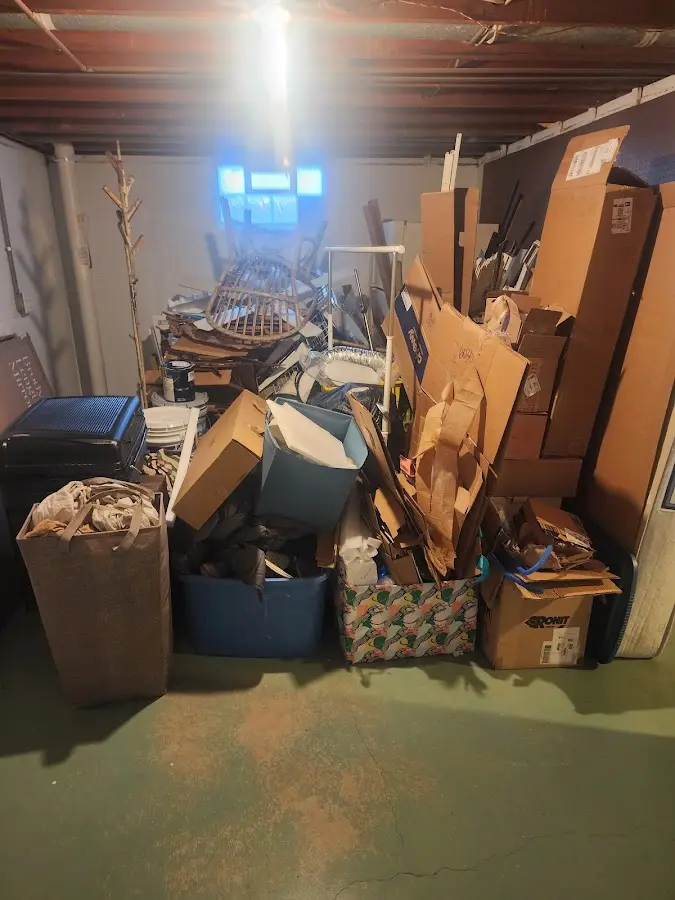 Roll-off dumpster container at job site for 15 Yard Dumpster Rental in Mundy